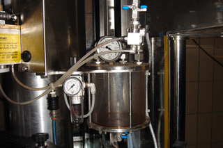 Clean beverage vats with steam.